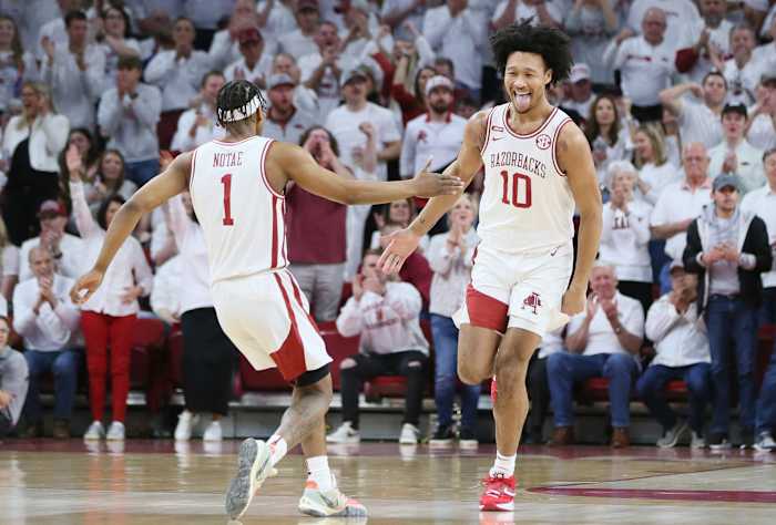 Arkansas Razorbacks guard JD Notae (1) celebrates with forward Jaylin Williams (10) after a score by Williams against the Kentucky Wildcats.